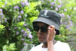 Black bucket hat with white Zuri Nzuri print