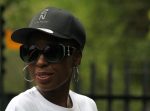 Model wearing black on black Zuri baseball cap