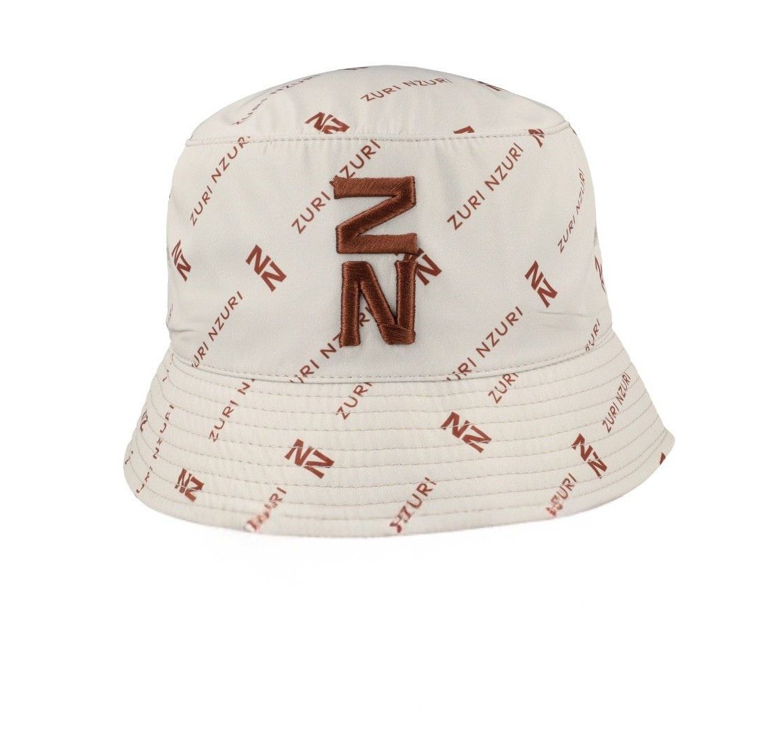 Sublimated bucket hat with all-over Zuri Nzuri print in toffee tones