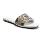 White beaded slip-on sandals with circular mandala beadwork design