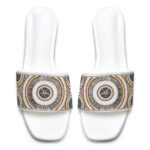 White beaded slip-on sandals with circular mandala beadwork design