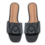 Jet black beaded slip-on sandals with graphic zig-zag beadwork