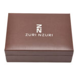 DUAFE gunmetal black boyfriend watch presented in chocolate brown PU case with interchangeable bezels