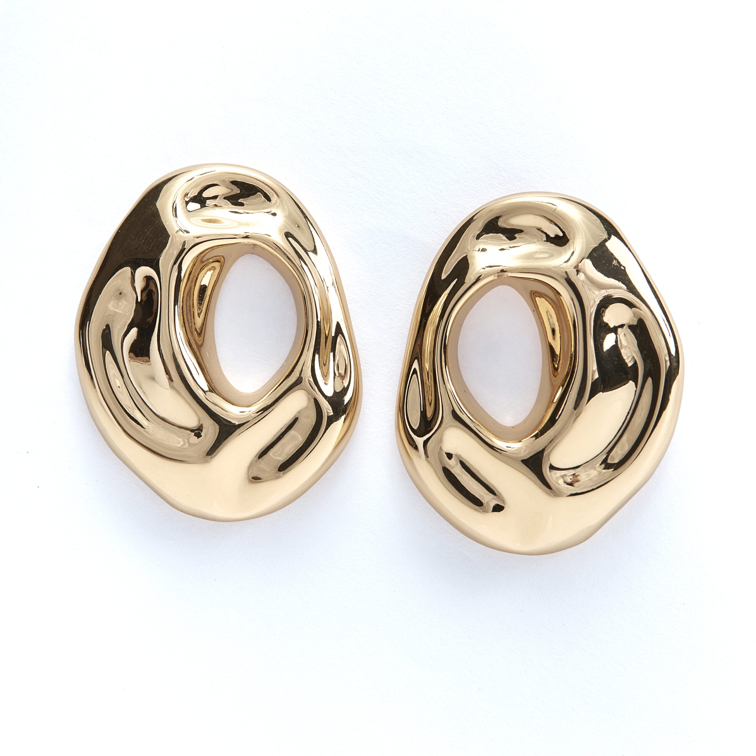 Mako gold sculptural earrings with fluid modern design Mako gold sculptural earrings with fluid modern design