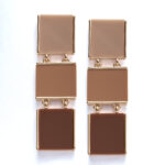 Abe Dua sands gold plated statement earrings with rectangular linked design
