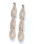 Bese Saka shimmer statement earrings with textured oval design