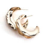 Aban gold sculptural hoop earrings with fluid textured design