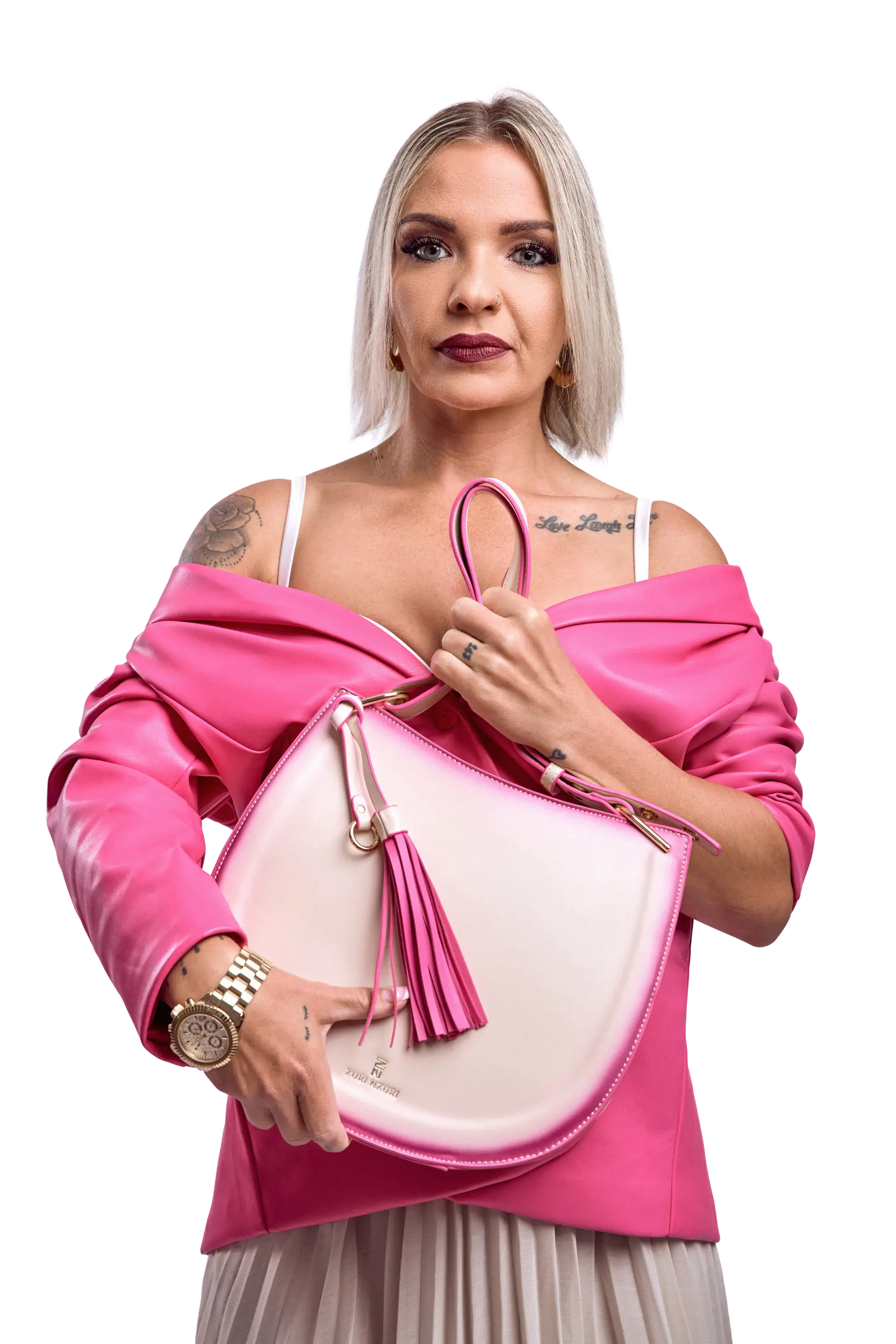 Model styled with the Mako cream half-moon bag with a whisper of pink in a playful contemporary outfit