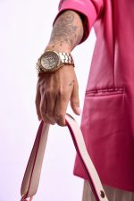 Model wearing Mako Rose gold boyfriend watch with interchangeable bezels