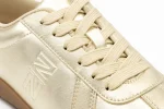 Zuri Luxe Gold Sneaker